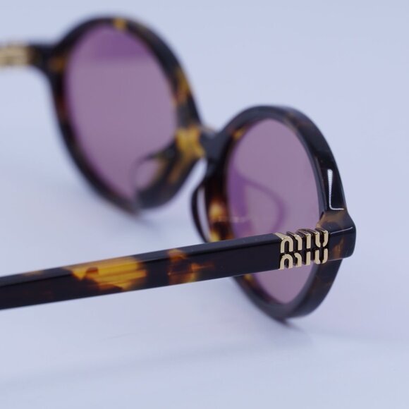 Miu Miu MU04ZSF VAU50D Sunglasses Honey Havana Oval Frame main image 10